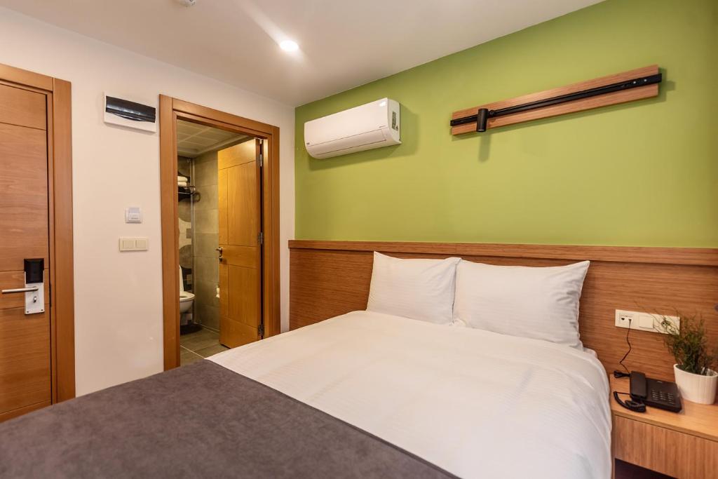 Postel nebo postele na pokoji v ubytování Bram Hotel Istanbul