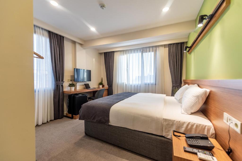 Postel nebo postele na pokoji v ubytování Bram Hotel Istanbul
