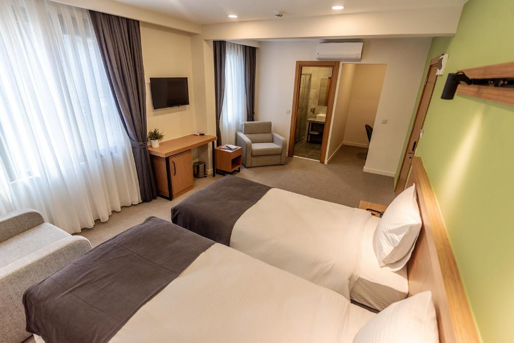 Postel nebo postele na pokoji v ubytování Bram Hotel Istanbul