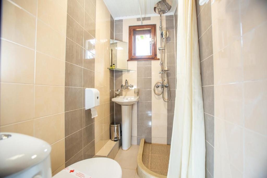 Koupelna v ubytování Oazis Family Hotel