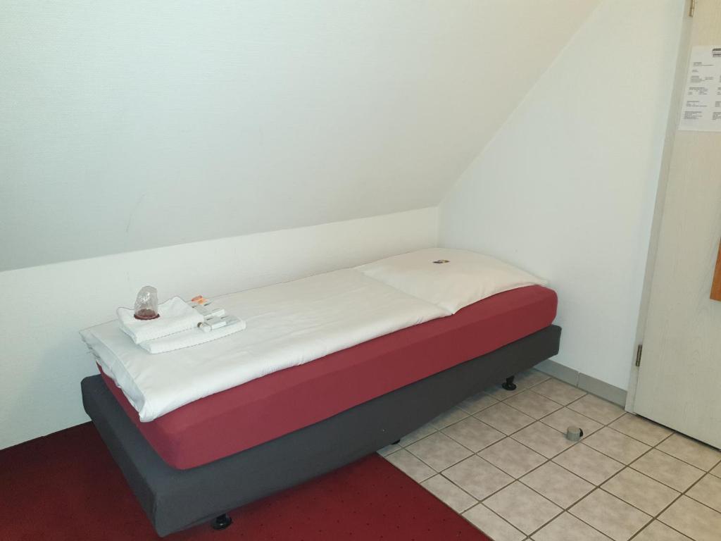 Postel nebo postele na pokoji v ubytování Hotel Neuwirtshaus