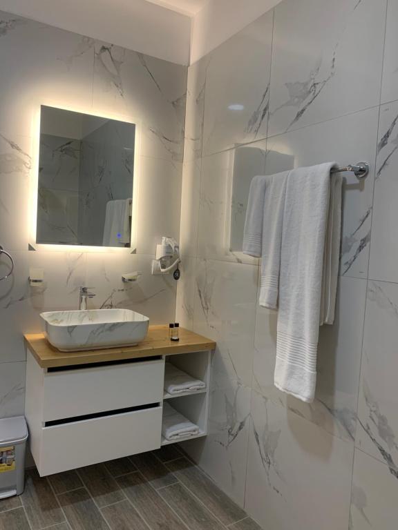 Koupelna v ubytování BELUX HOTEL