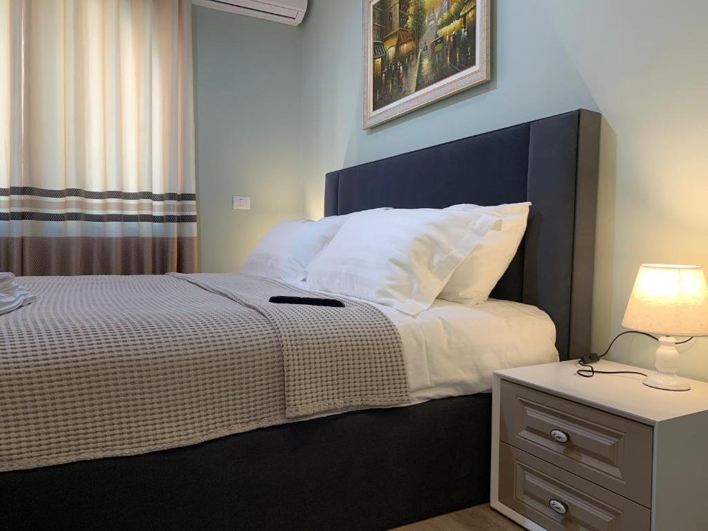Postel nebo postele na pokoji v ubytování BELUX HOTEL