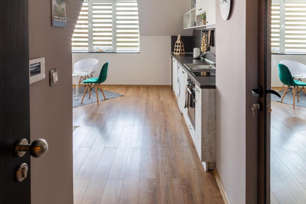 Kuchyň nebo kuchyňský kout v ubytování Gladstone suites