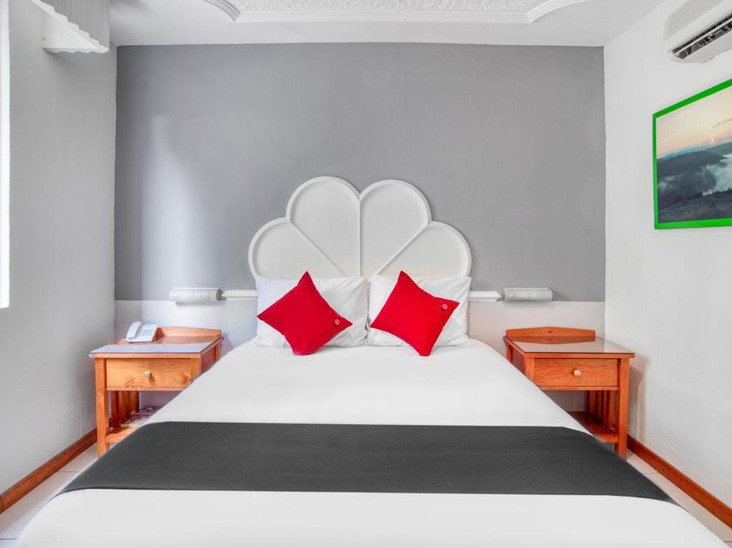 Postel nebo postele na pokoji v ubytování Hotel y Spa Posada Mirador