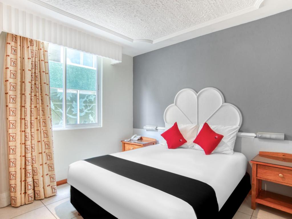 Postel nebo postele na pokoji v ubytování Hotel y Spa Posada Mirador
