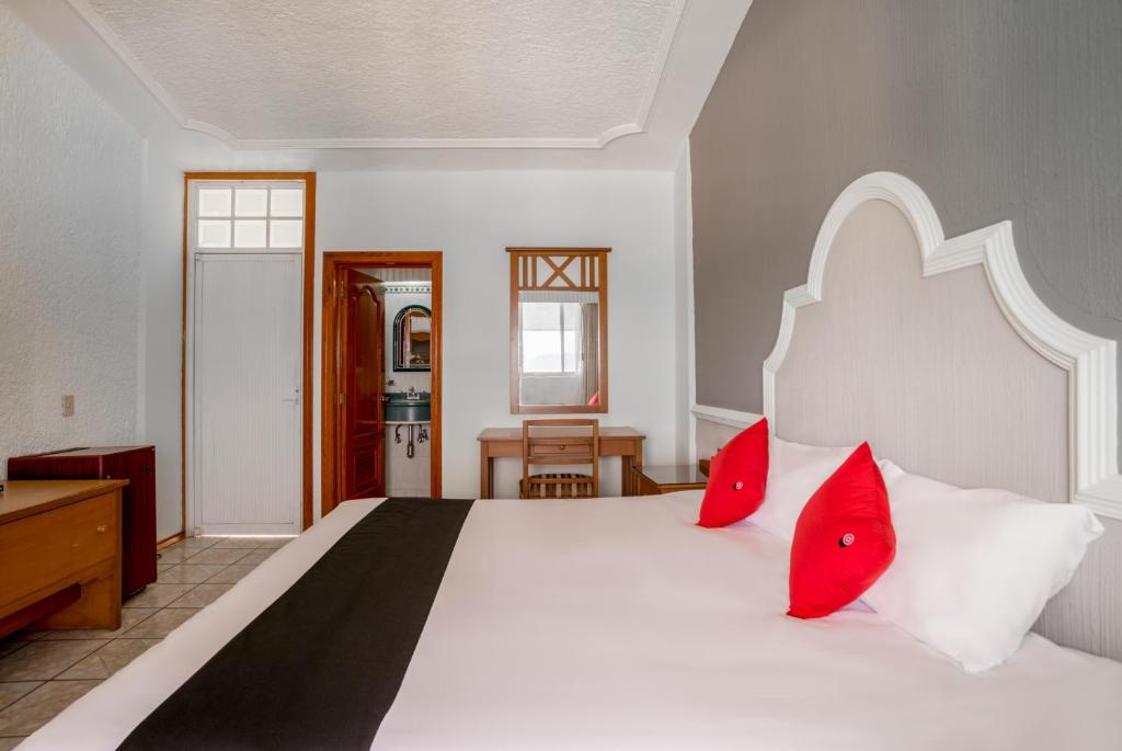 Postel nebo postele na pokoji v ubytování Hotel y Spa Posada Mirador