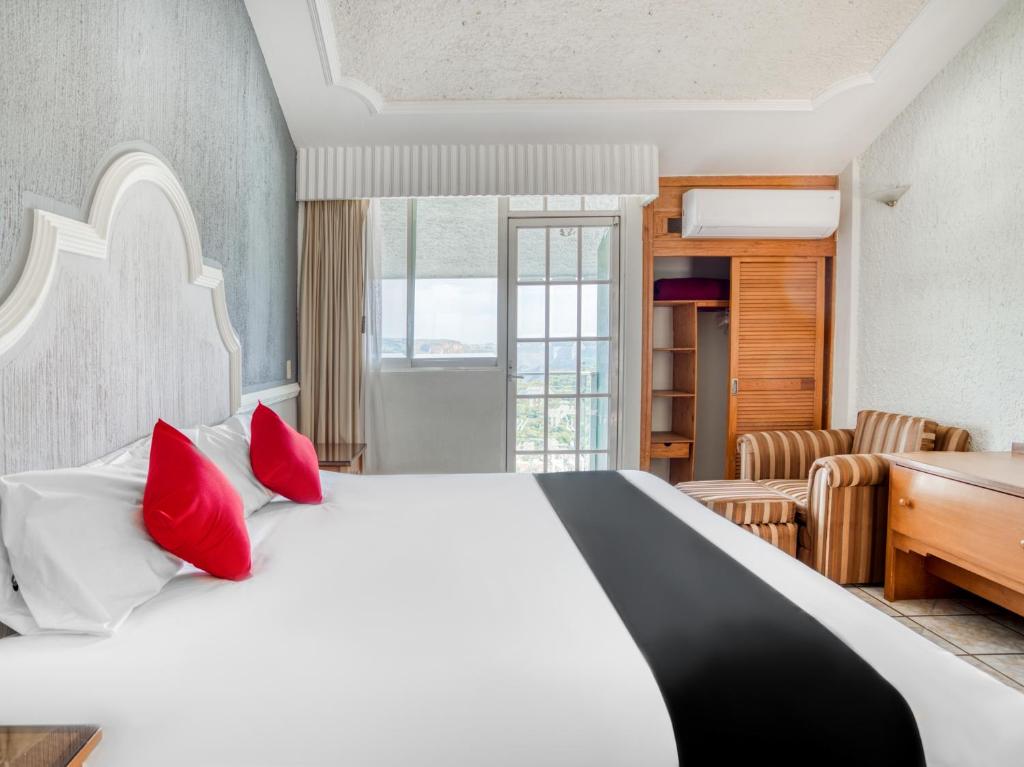 Postel nebo postele na pokoji v ubytování Hotel y Spa Posada Mirador