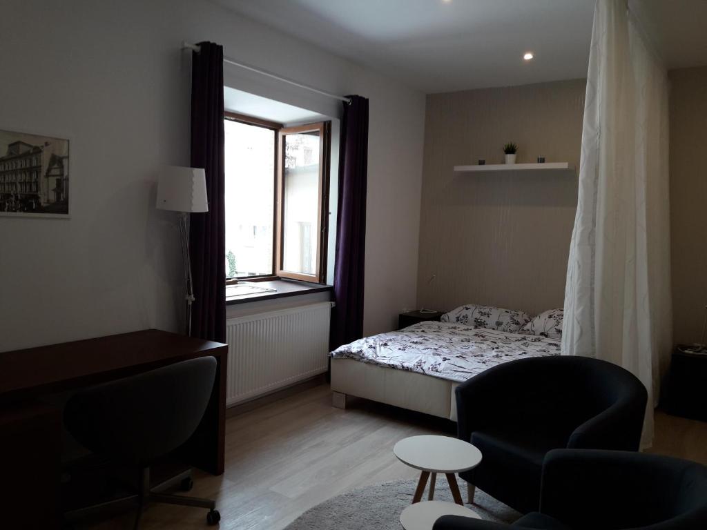Postel nebo postele na pokoji v ubytování Atrium Apartments