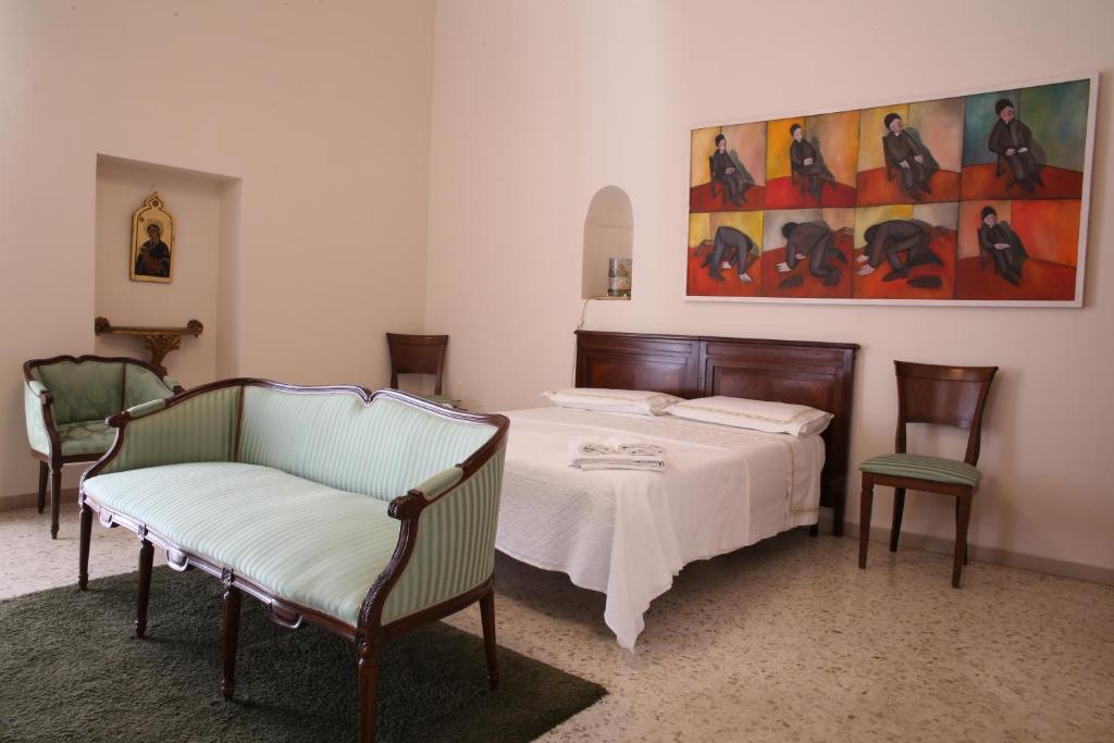 Posteľ alebo postele v izbe v ubytovaní Casa Catalano