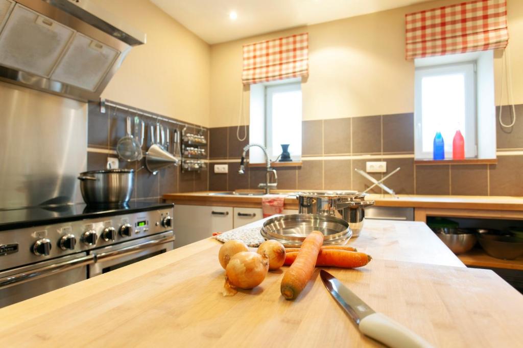 Kuchyň nebo kuchyňský kout v ubytování L'Atelier du Moulin d'en Bas