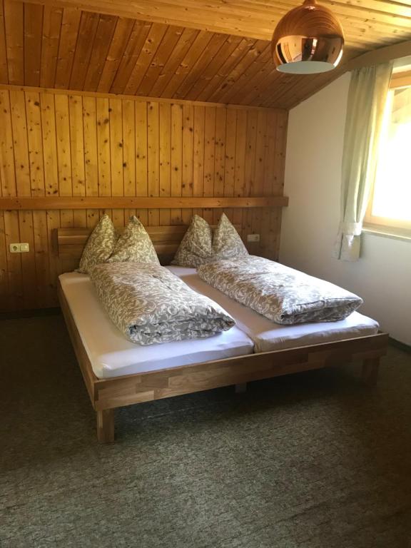 Postel nebo postele na pokoji v ubytování Reiterhof Nigglgut
