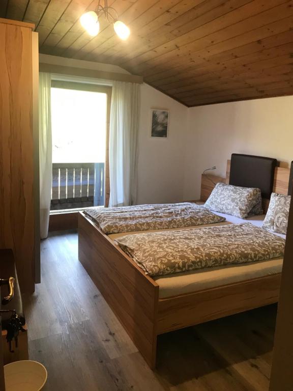 Postel nebo postele na pokoji v ubytování Reiterhof Nigglgut