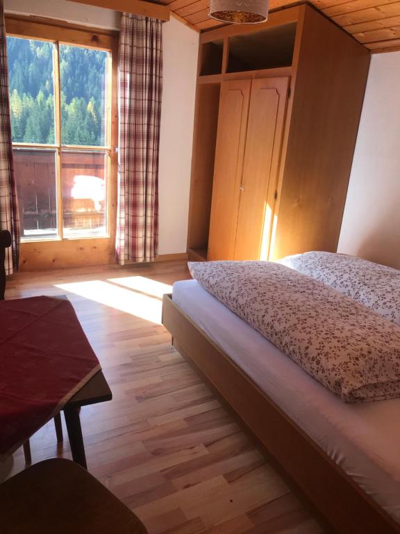 Postel nebo postele na pokoji v ubytování Reiterhof Nigglgut