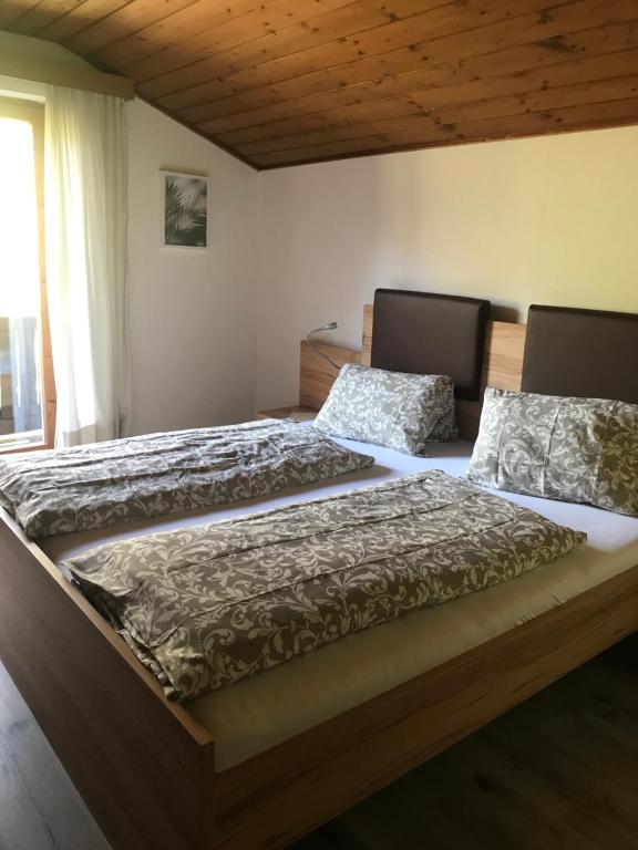 Postel nebo postele na pokoji v ubytování Reiterhof Nigglgut