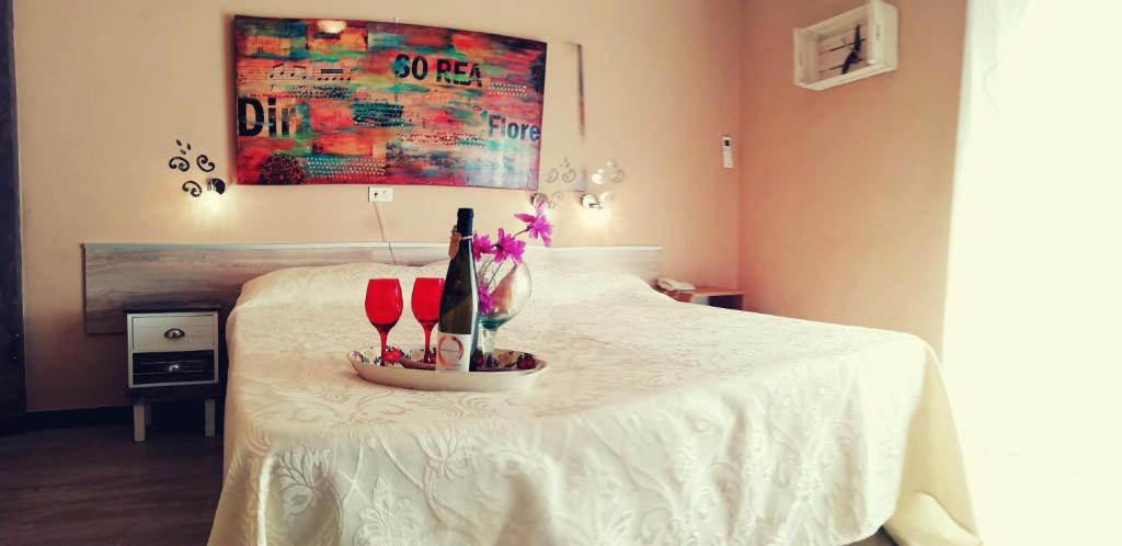 Postel nebo postele na pokoji v ubytování Hotel Eva La Romantica