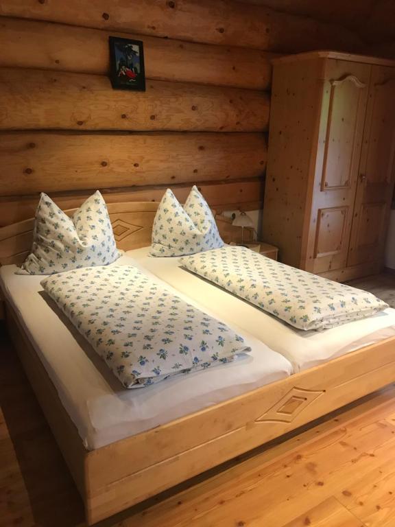 Postel nebo postele na pokoji v ubytování Reiterhof Nigglgut