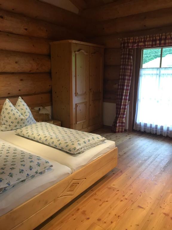 Postel nebo postele na pokoji v ubytování Reiterhof Nigglgut