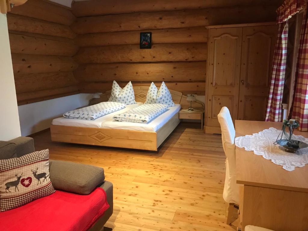 Postel nebo postele na pokoji v ubytování Reiterhof Nigglgut