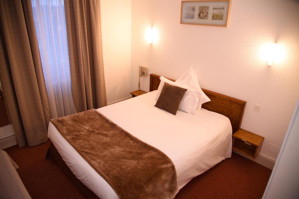 Postel nebo postele na pokoji v ubytování Hôtel Deybach