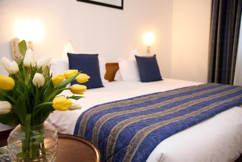 Postel nebo postele na pokoji v ubytování Hôtel Deybach