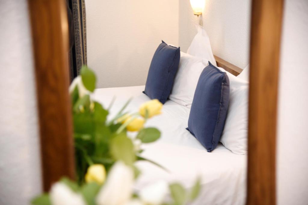 Postel nebo postele na pokoji v ubytování Hôtel Deybach