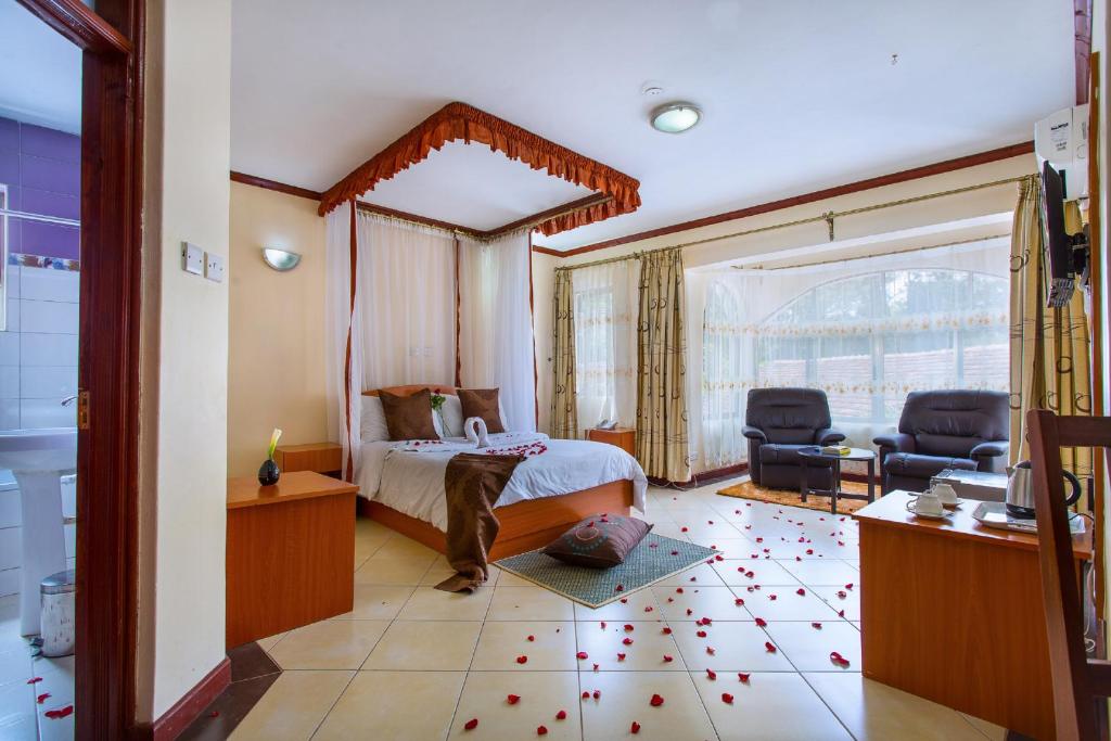 TV a/nebo společenská místnost v ubytování Convent International Hotel- Nairobi