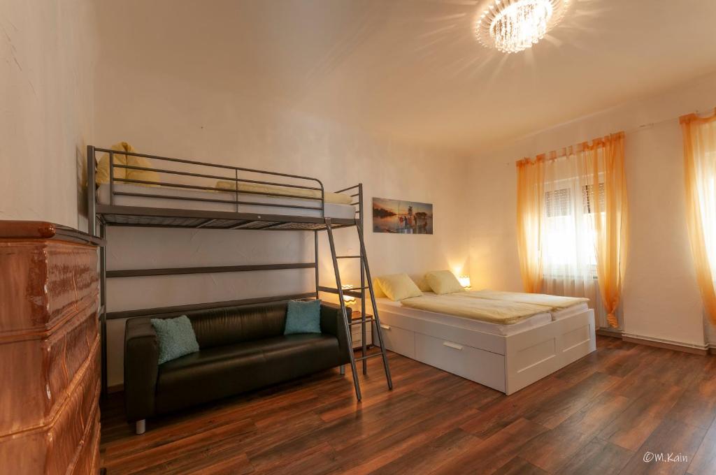 Posteľ alebo postele v izbe v ubytovaní Familienferienhaus Amelie