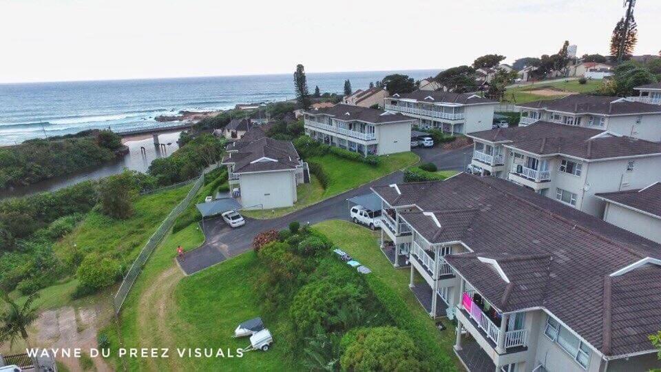 an aerial view of a house next to the ocean at Mangrove Beach Estate, Dadda's Place, 321 Bokmakierie WY in Melville