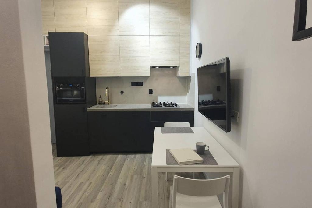 Kuchnia lub aneks kuchenny w obiekcie JOIVY Heart of the City 1 Bed Apt near Castle Belvedere