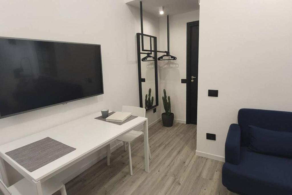 Telewizja i/lub zestaw kina domowego w obiekcie JOIVY Heart of the City 1 Bed Apt near Castle Belvedere