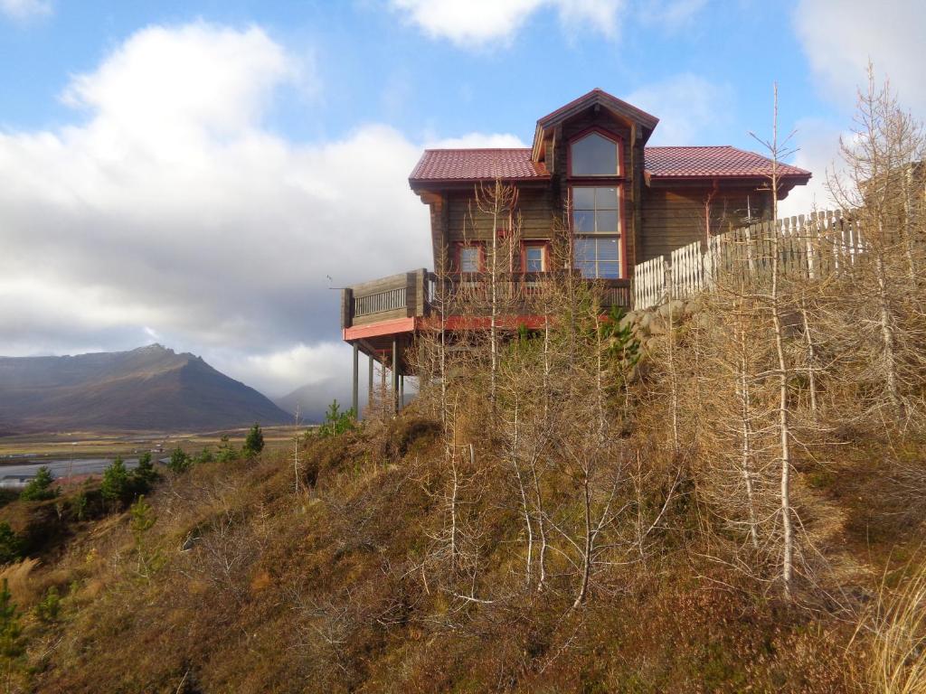 a house on the top of a hill at Family Home in Fáskrúðsfjörður
