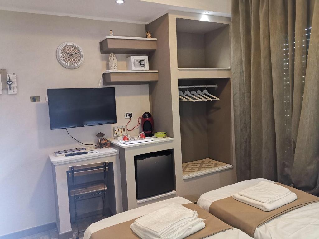 Łóżko lub łóżka w pokoju w obiekcie Guesthouse Luisella