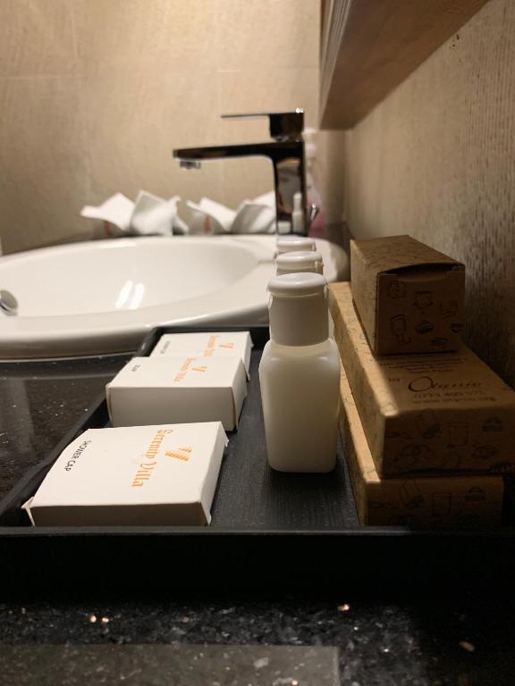 Postel nebo postele na pokoji v ubytování Serenity Villa Digana