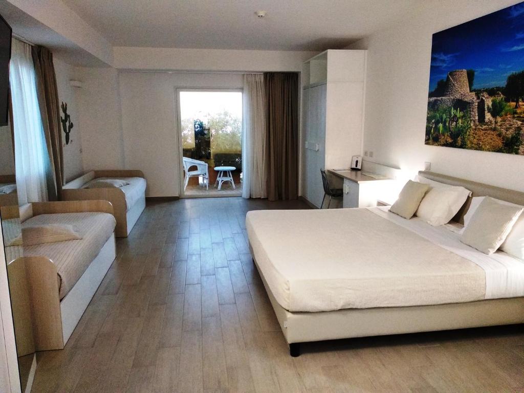 Кровать или кровати в номере Est hotel