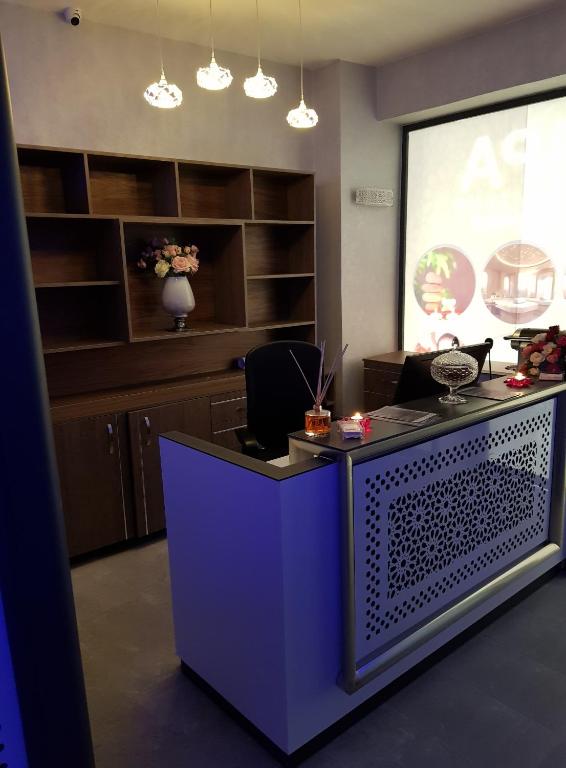 TV a/nebo společenská místnost v ubytování El Oumnia Puerto & Spa