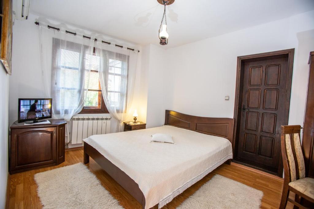 Postel nebo postele na pokoji v ubytování Oazis Family Hotel