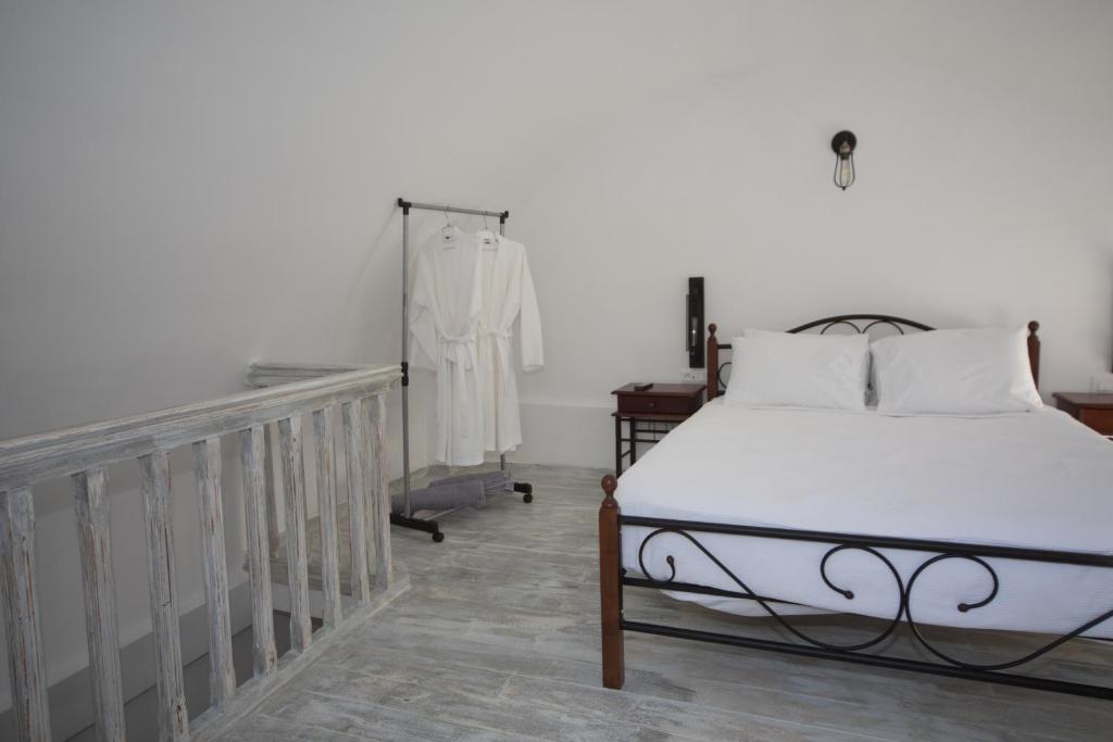 Letto o letti in una camera di Villa Galaxy Santorini