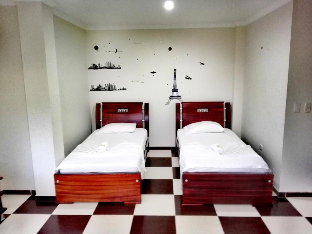 Postel nebo postele na pokoji v ubytování Hotel Prado Country