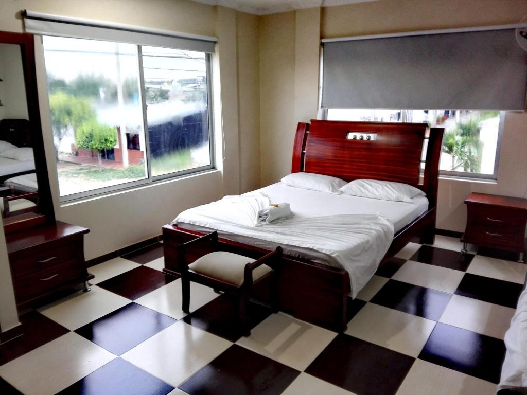 Postel nebo postele na pokoji v ubytování Hotel Prado Country