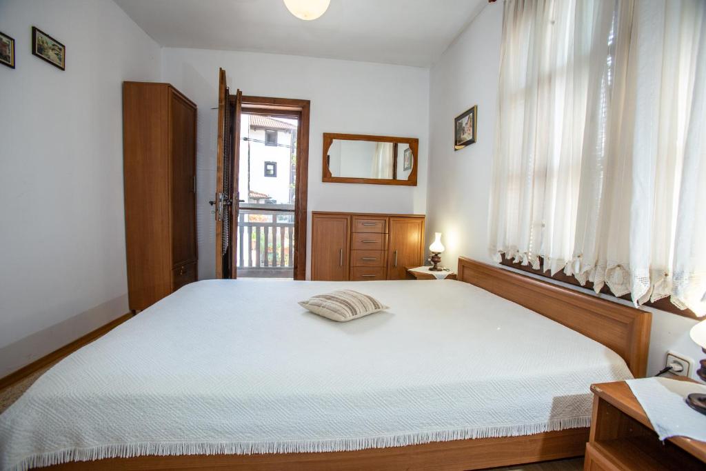 Postel nebo postele na pokoji v ubytování Oazis Family Hotel