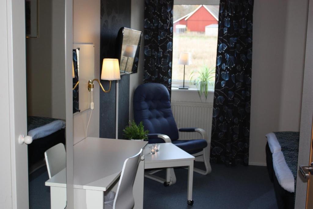 Posezení v ubytování Hotell Angöringen