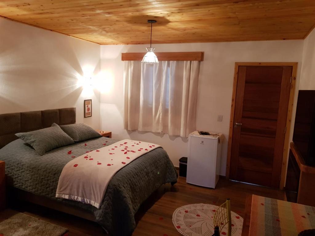 Postel nebo postele na pokoji v ubytování Latvia Chalés