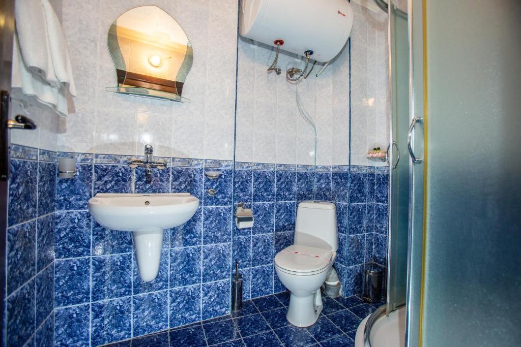 Koupelna v ubytování Oazis Family Hotel