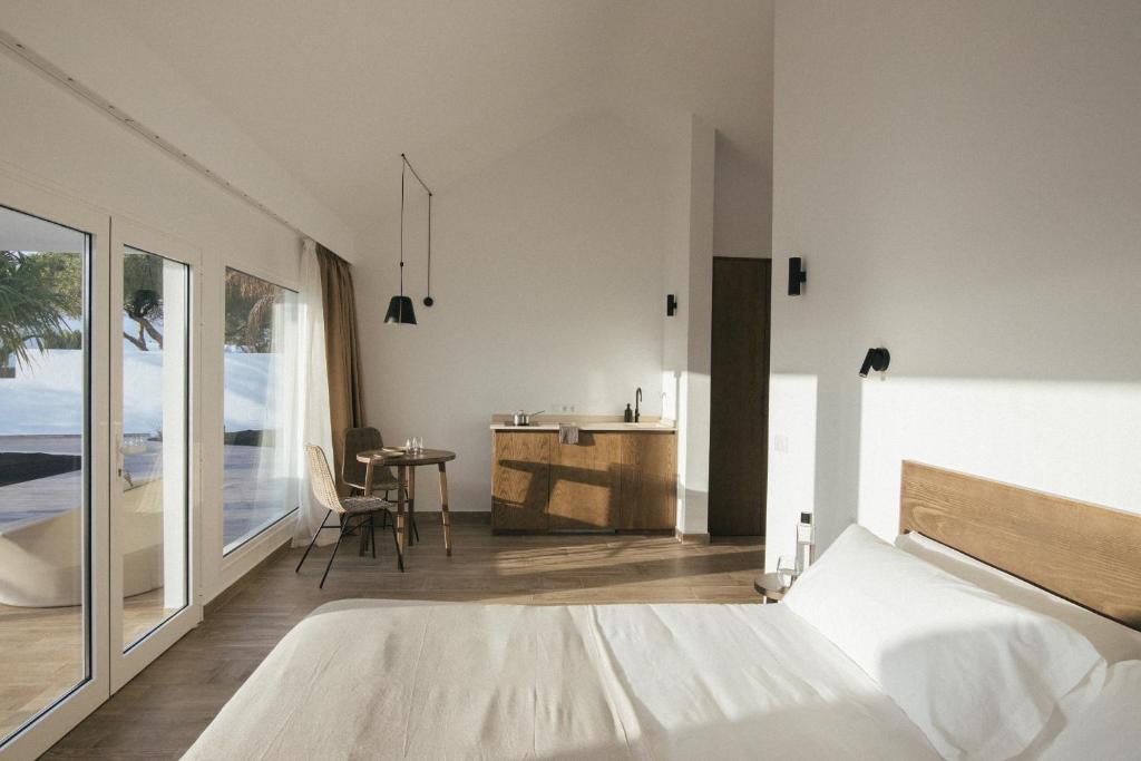 Postel nebo postele na pokoji v ubytování Alava Suites