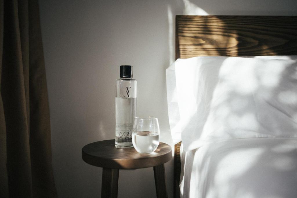 Postel nebo postele na pokoji v ubytování Alava Suites