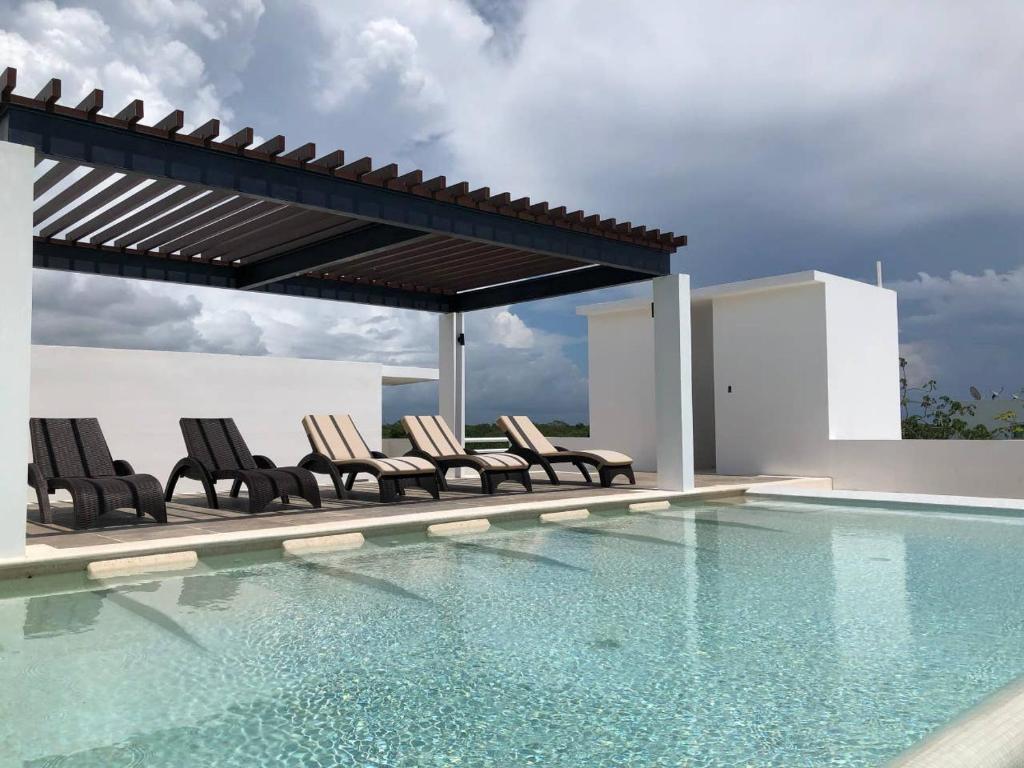 COZY GROUND FLOOR 2 BEDROOM CONDO IN SIRENIS RESORT, OCEAN SIDE
