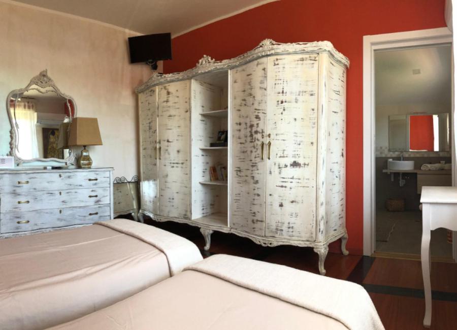 Postel nebo postele na pokoji v ubytování B&B Via Roma