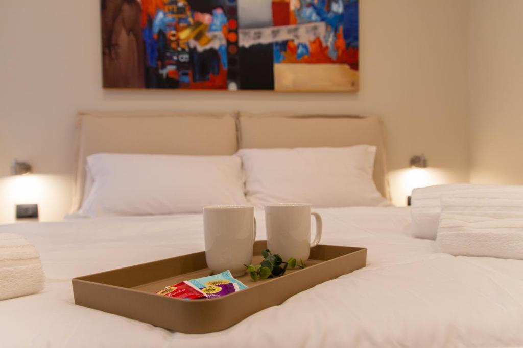 A bed or beds in a room at Prati 25.7 Suites in Rome