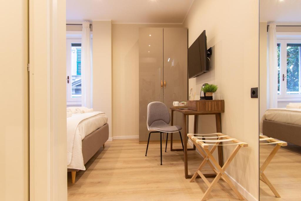A bed or beds in a room at Prati 25.7 Suites in Rome